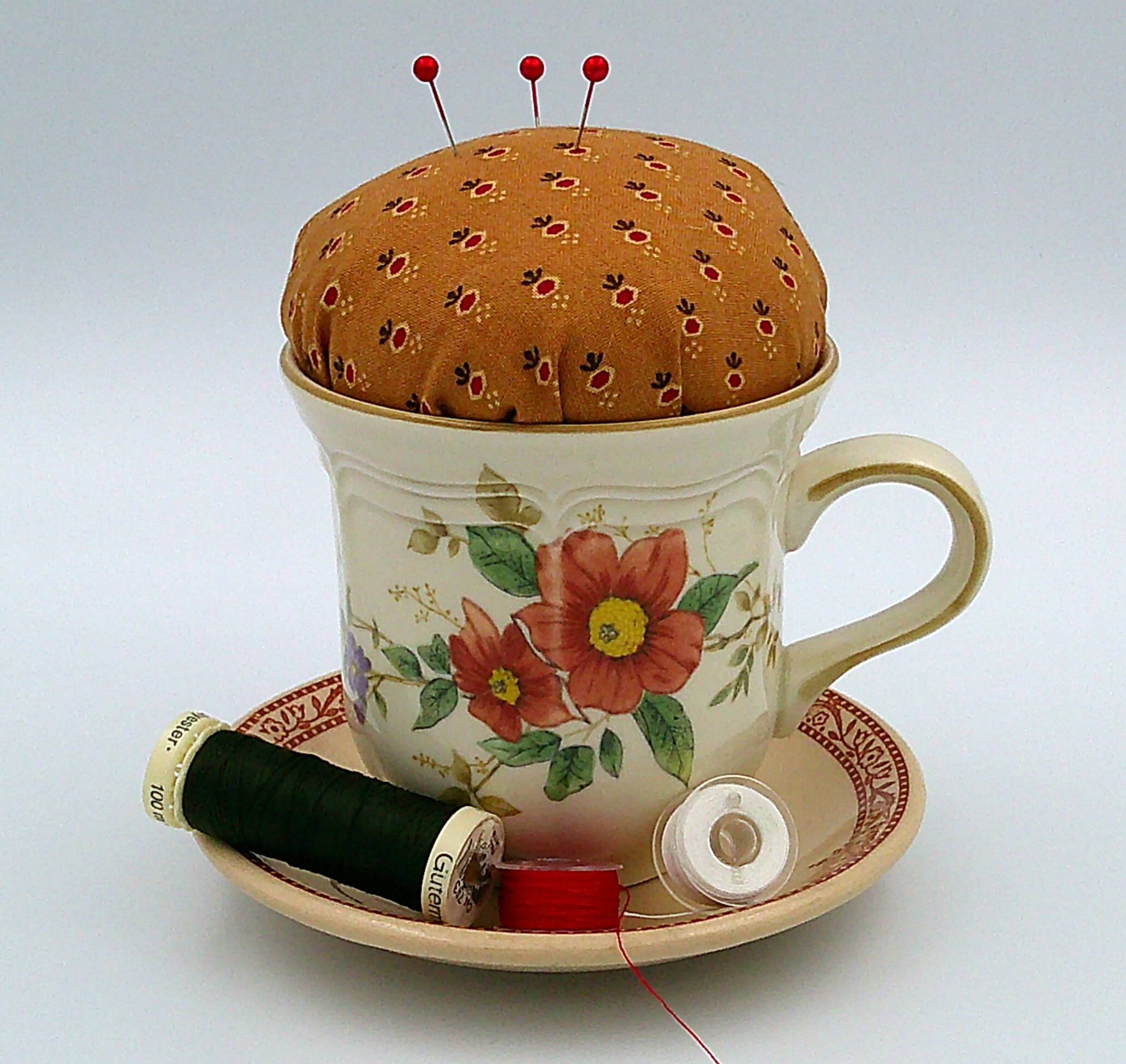 This shows an example of thread and bobbins in the bobbin holder. Thread and bobbins are NOT for sale. This shows an example of thread and bobbins in the bobbin holder. Thread and bobbins are NOT for sale.